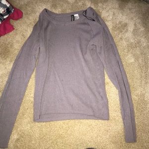 Long sleeve shirt, several circles in each sleeve